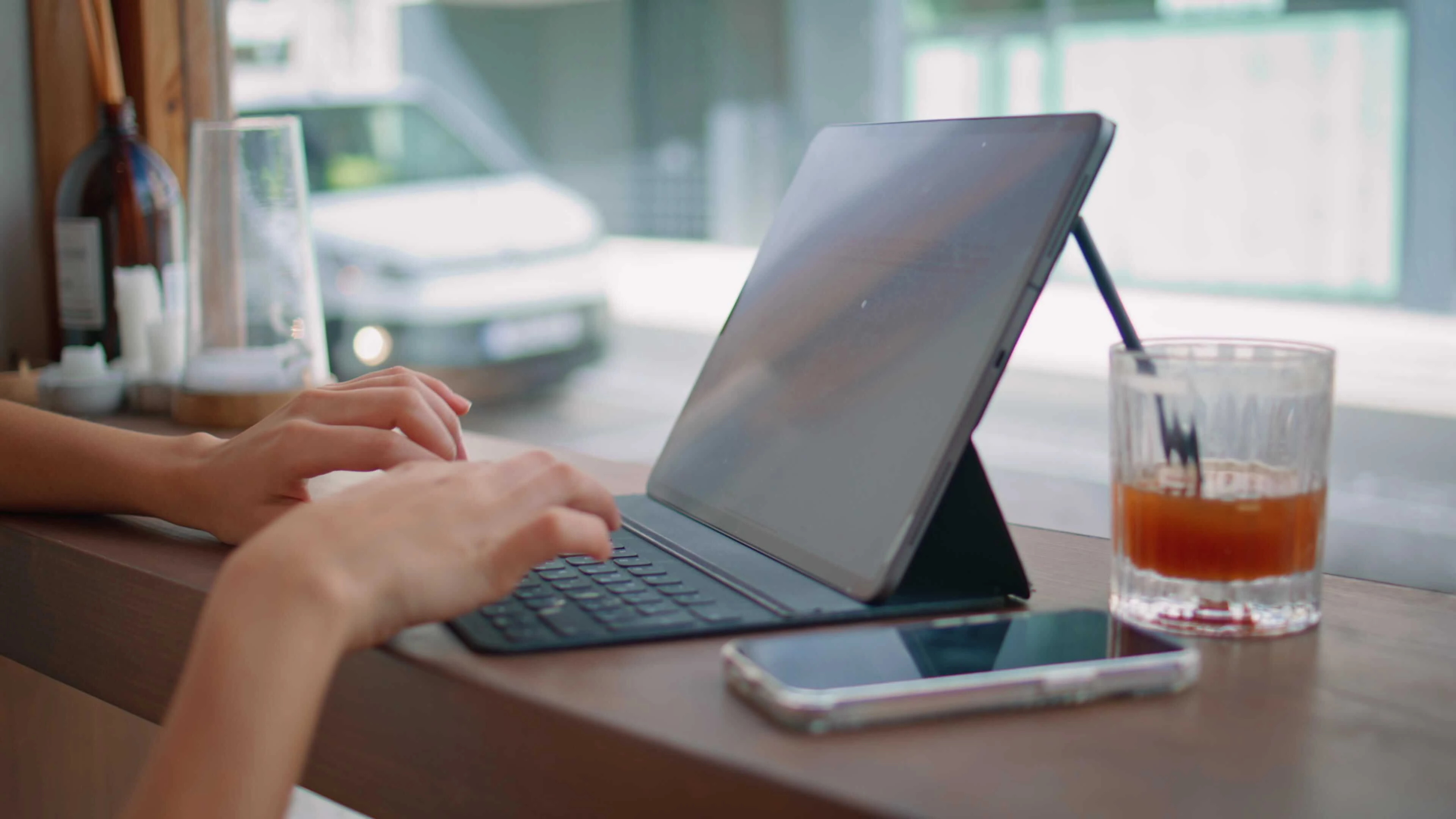 Apple iPad with Magic Keyboard showing split screen multitasking and typing setup